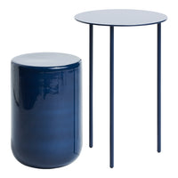 "Modern navy blue side table set featuring a round top and a cylindrical accent piece."