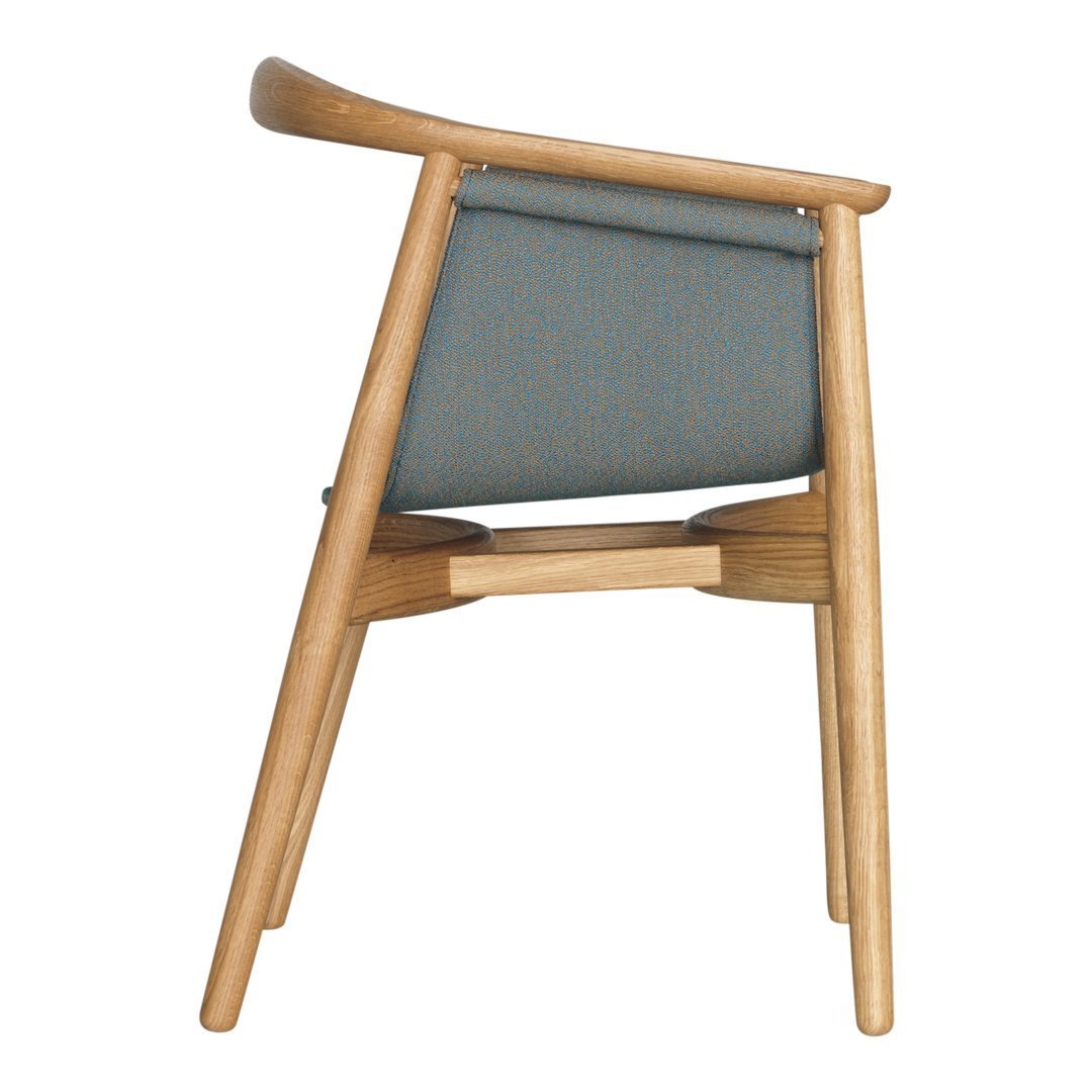 Light wood chair with a soft blue fabric seat and backrest, featuring a minimalist design and natural finish.