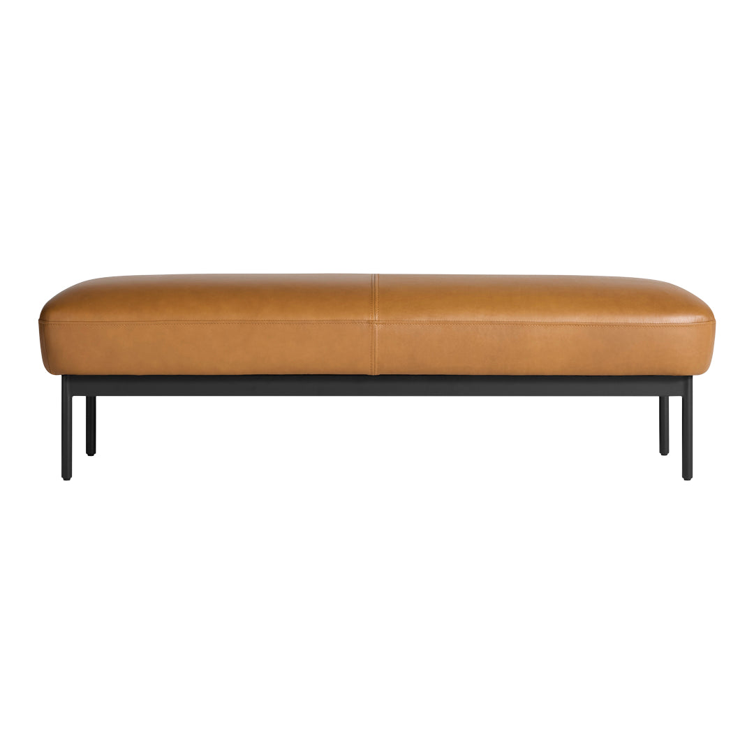 Tan leather bench with a sleek black metal base, featuring a smooth, minimalist design. Ideal for modern interiors.