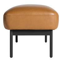 Tan leather ottoman with sleek black metal legs, featuring a smooth, rounded design. Ideal for modern decor.