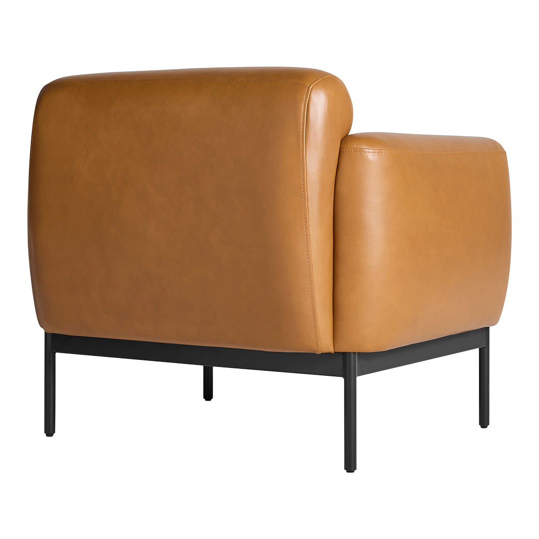 Tan leather armchair with a smooth, modern design and black metal legs for a contemporary look.