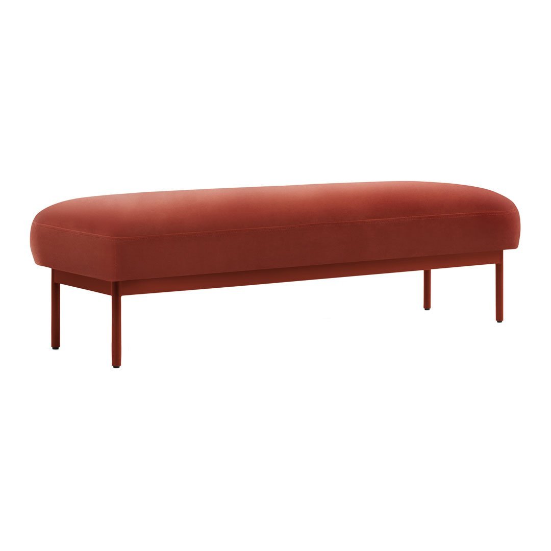 Rust-colored velvet bench with smooth, rounded edges and sleek metal legs. Perfect for modern home decor.