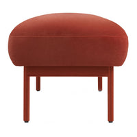 Rust velvet pouf with a smooth texture and round design, complemented by a solid orange frame. Ideal for modern decor.