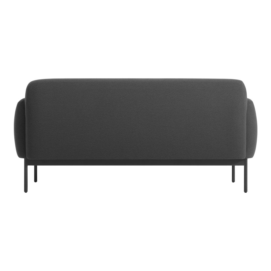 "Back view of a sleek, upholstered gray sofa with a minimalist design and round armrests on black metal legs."