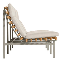 Light beige cushions with a minimalistic design, accented by natural wood and sleek gray metal frame.