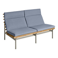 Light blue cushions with a sleek wooden frame on a modern sofa, offering a minimalist design and contemporary style.