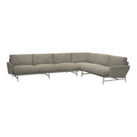 Gray sectional sofa with a textured fabric pattern and sleek metal legs, perfect for modern living spaces.