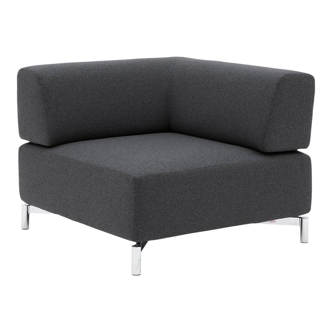 Dark gray modular corner sofa with a minimalist design and smooth fabric upholstery. Sleek chrome legs add modern touch.