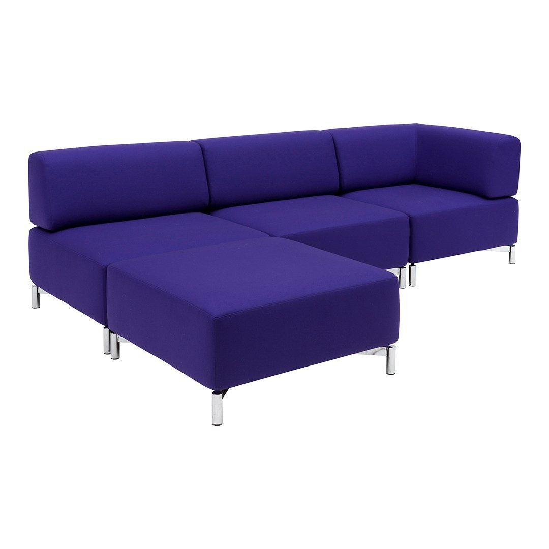 Vibrant purple sectional sofa with clean lines and a modern design, featuring a sleek silver leg finish.