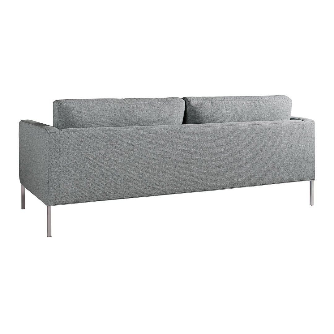 Gray upholstered sofa with clean lines and simple design, featuring a smooth, solid fabric finish.