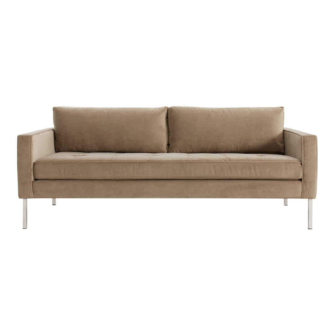 Neutral beige fabric sofa with clean lines and two plush back cushions, complemented by sleek metal legs.