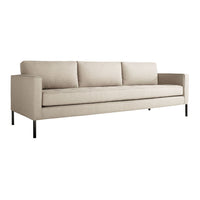 Beige modern sofa with sleek lines and three plush cushions, featuring a minimalist design on black legs.