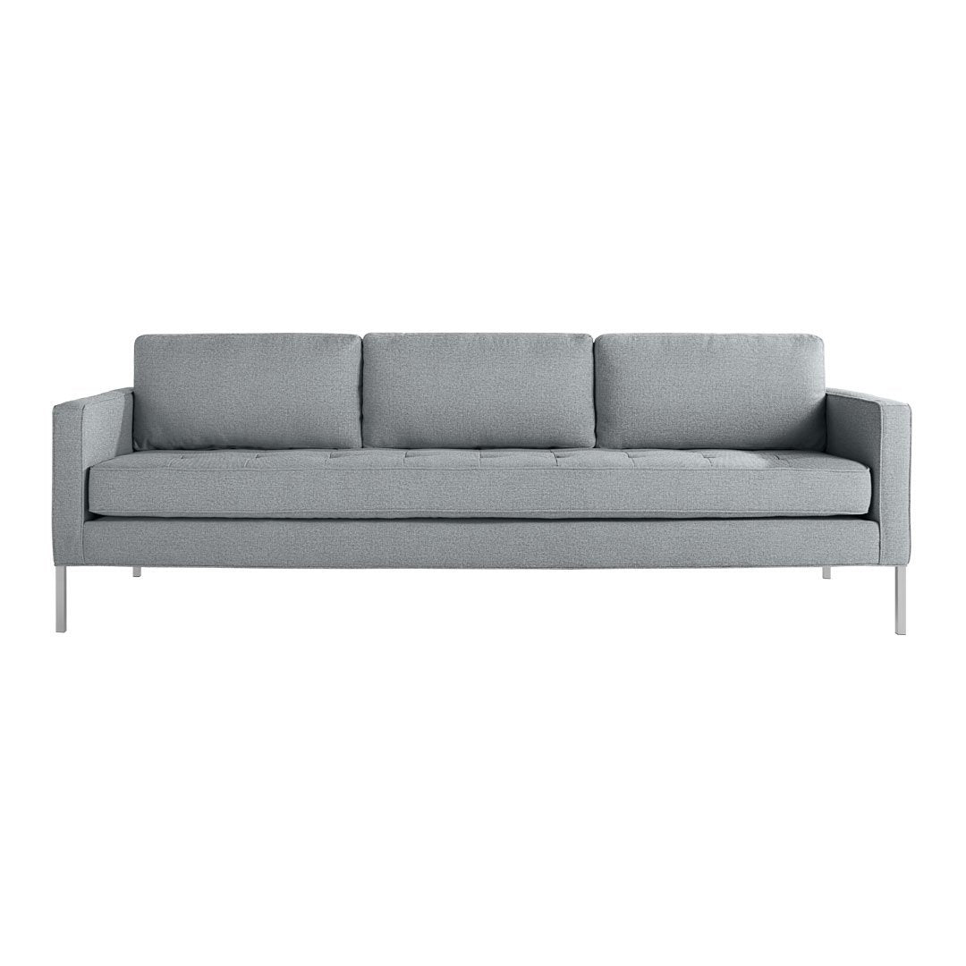 Stylish light gray sofa with a sleek, minimalist design and soft, fabric texture, perfect for modern decor.