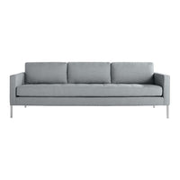 Stylish light gray sofa with a sleek, minimalist design and soft, fabric texture, perfect for modern decor.