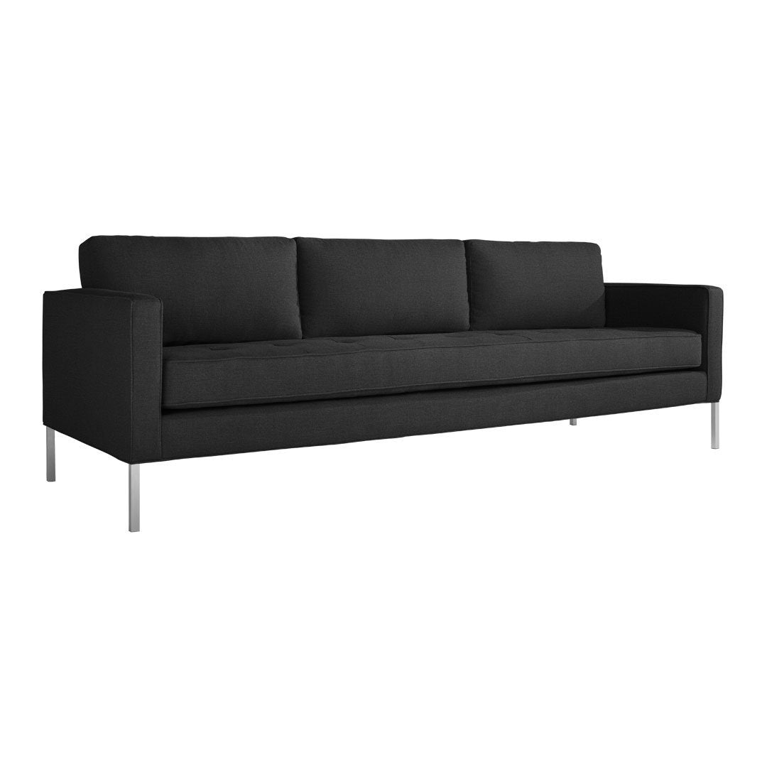 Modern black sofa with sleek lines and minimalist design, featuring a solid color and no visible patterns.