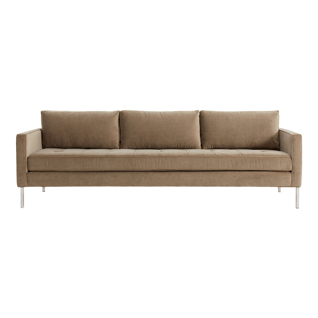 Stylish beige sofa with a smooth fabric texture and sleek modern design, featuring three plush cushions.