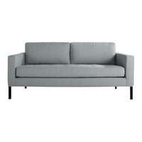 "Light gray modern sofa with clean lines and simple, solid fabric design."