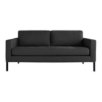 Modern black sofa with sleek lines and minimalist design, featuring a solid color upholstery and no visible patterns.
