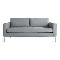 Gray upholstered sofa with clean lines and two plush cushions, featuring a modern, minimalist design.