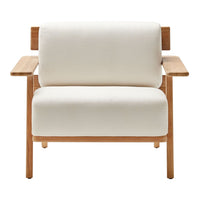 Cream-colored fabric armchair with natural wood accents, featuring a minimalist design and clean lines.
