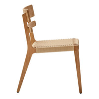 Natural wood chair with a light oak finish and woven cane seat, featuring minimalist lines and patterns.