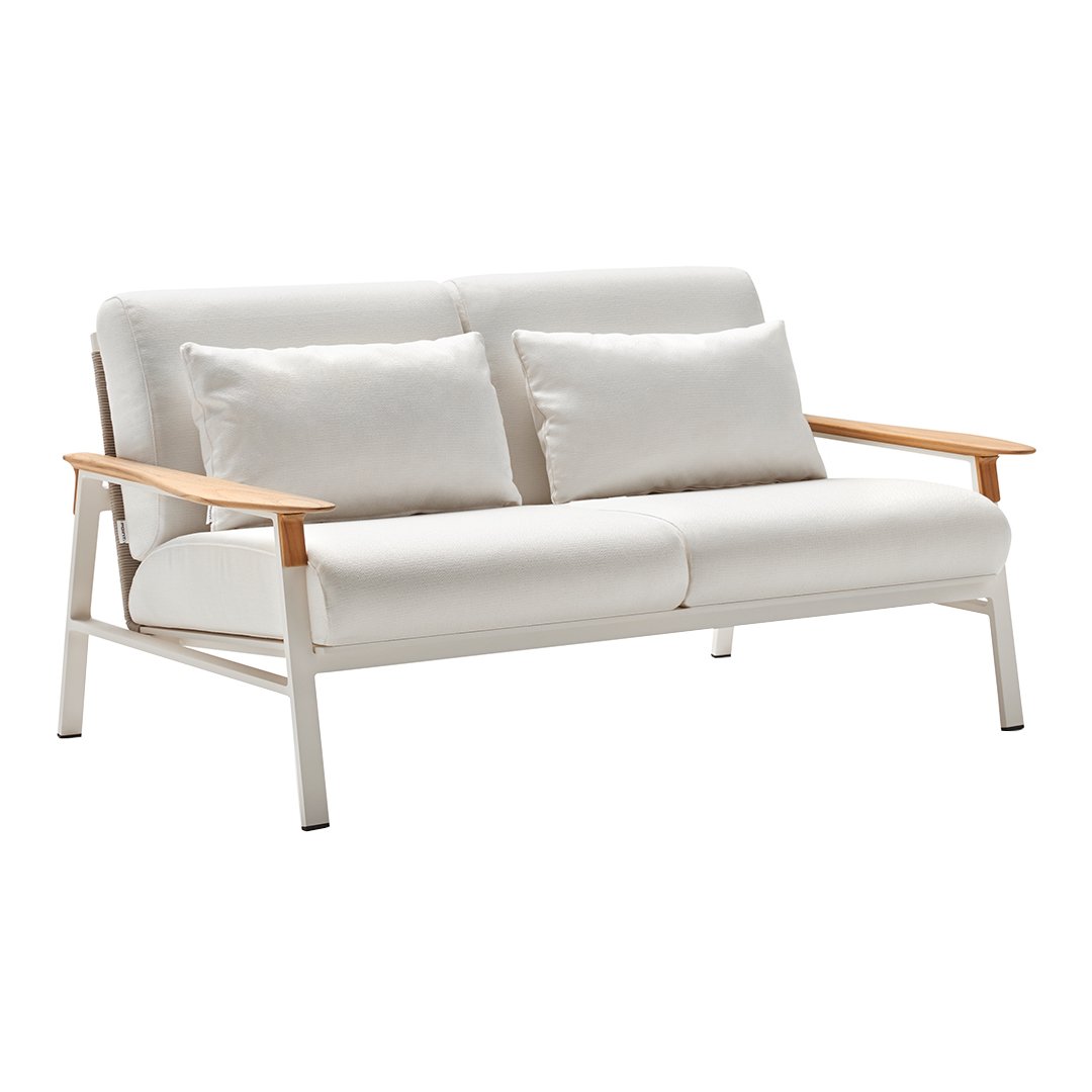 Light gray fabric sofa with wooden armrests and two plush cushions, modern design, minimalistic and stylish look.