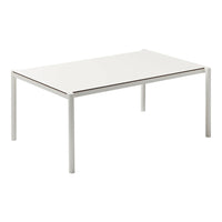 White rectangular table with a smooth, glossy surface and minimalist design. Modern aesthetic with sleek metal legs.