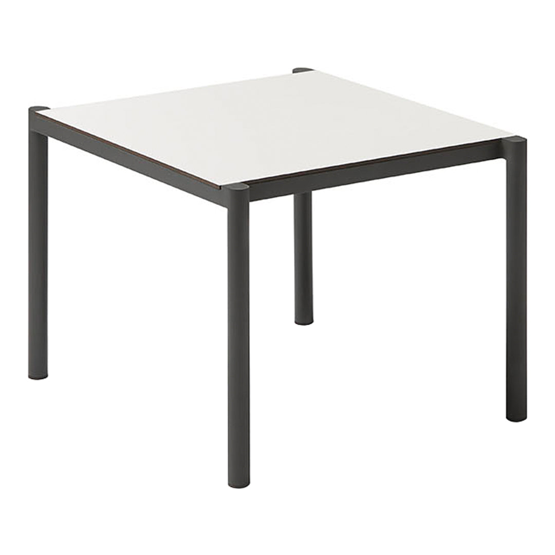 White square tabletop with sleek black metal legs, featuring a minimalist and modern design. Perfect for any decor.