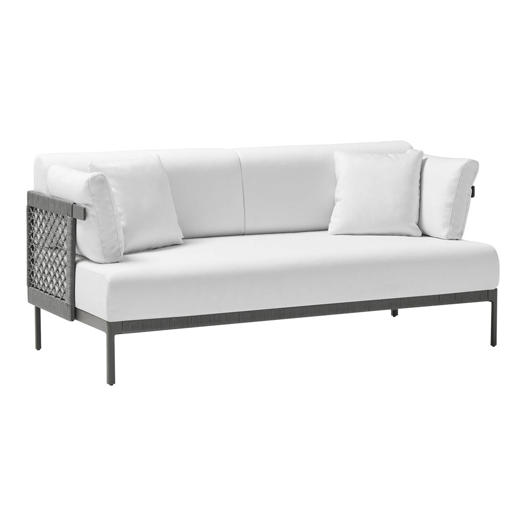 White outdoor sofa with textured black metal frame and plush white cushions, perfect for modern patio decor.