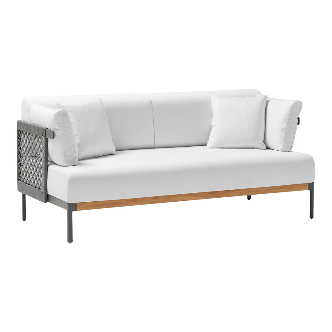Modern two-tone sofa in crisp white with neutral cushions and a sleek grey frame. Stylish design with geometric patterns.