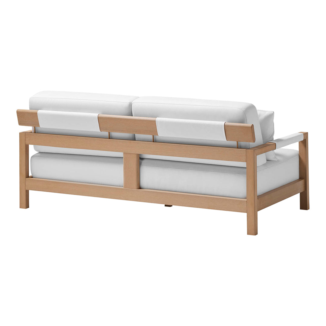 White cushions on a light wood frame sofa, featuring a clean, minimalist design. Perfect for modern decor.