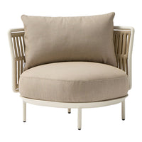 Beige circular chair with a soft, textured cushion and woven rattan backrest, featuring a minimalist design.