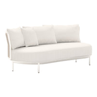 White curved sofa with textured fabric and plush cushions, featuring a minimalist design and sleek metal legs.