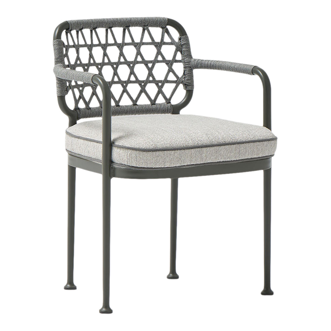 "Modern black patio chair with a geometric woven back and light gray fabric cushion."