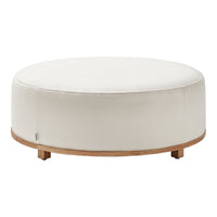 Round white ottoman with a smooth fabric top and natural wood base, perfect for modern decor.