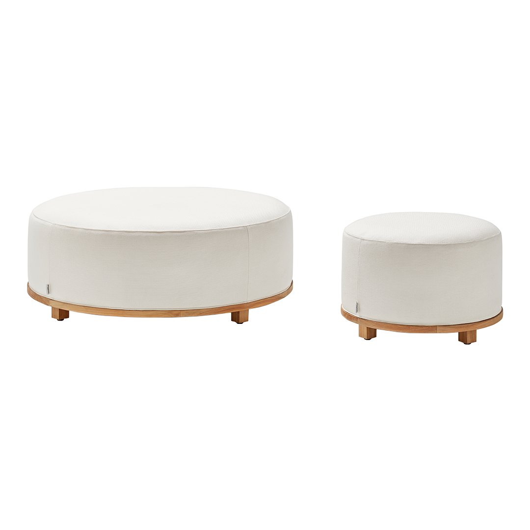 White upholstered ottomans with natural wood bases, featuring a smooth, minimalist design. Perfect for modern decor.