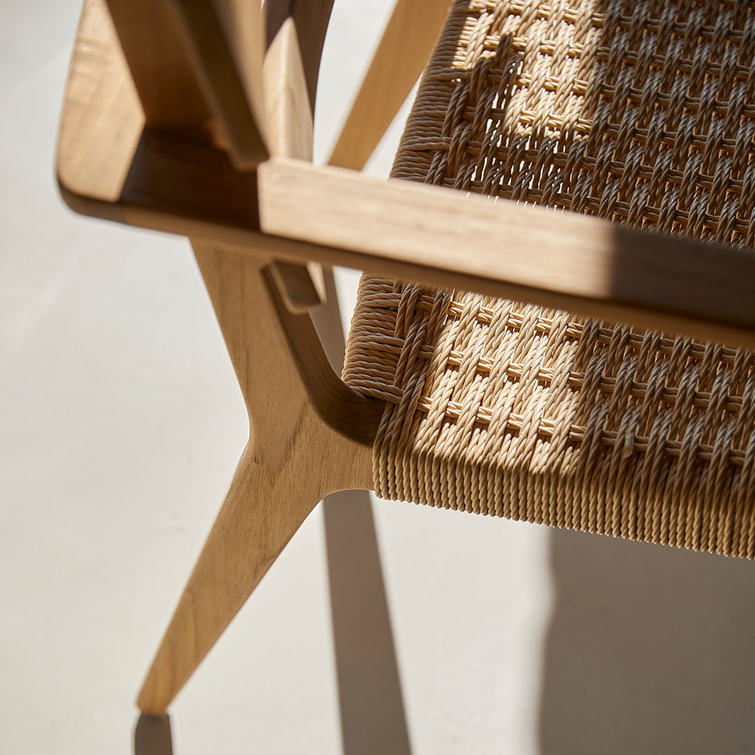 Natural wood tones with woven beige pattern, showcasing an elegant texture in a minimalist design.