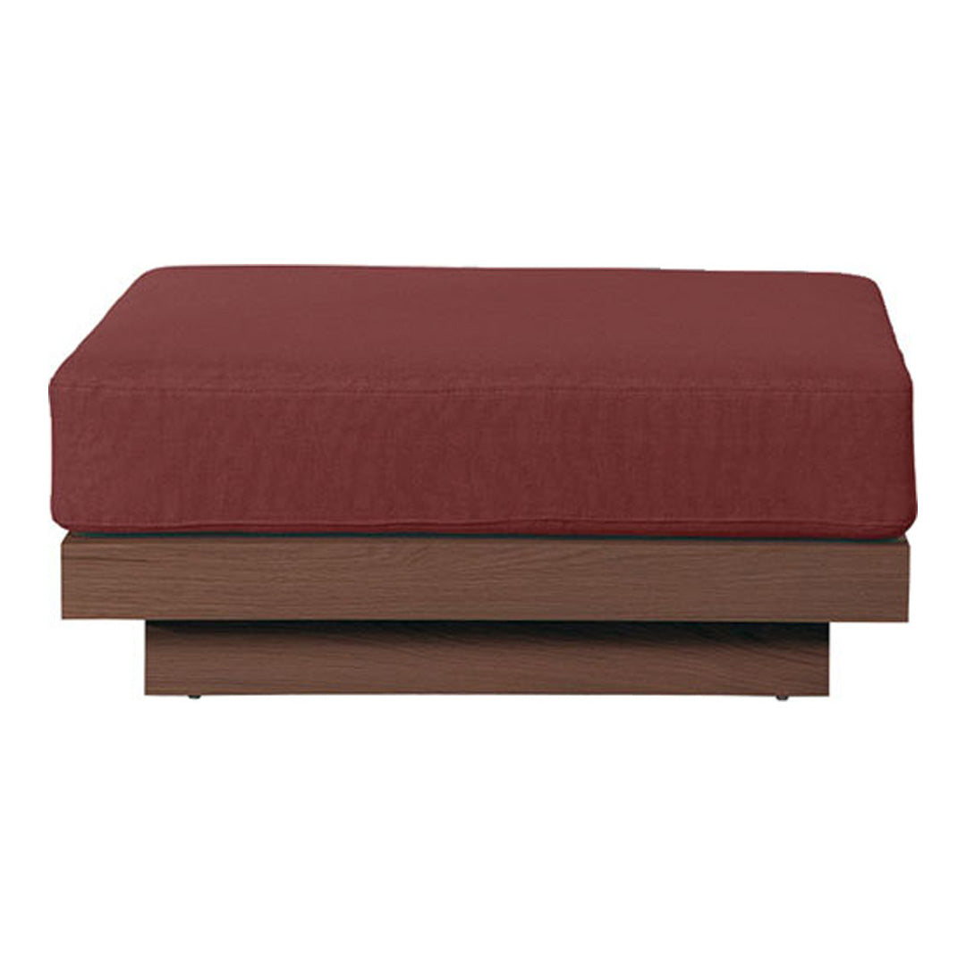 "Deep red upholstery on a modern wooden base, featuring a textured pattern for added sophistication."
