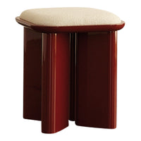 "Stylish red stool with a soft cream upholstery, featuring a sleek, modern design and smooth finish."