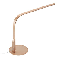 Sleek rose gold desk lamp with a minimalist design and smooth finish, featuring a curved arm and round base.