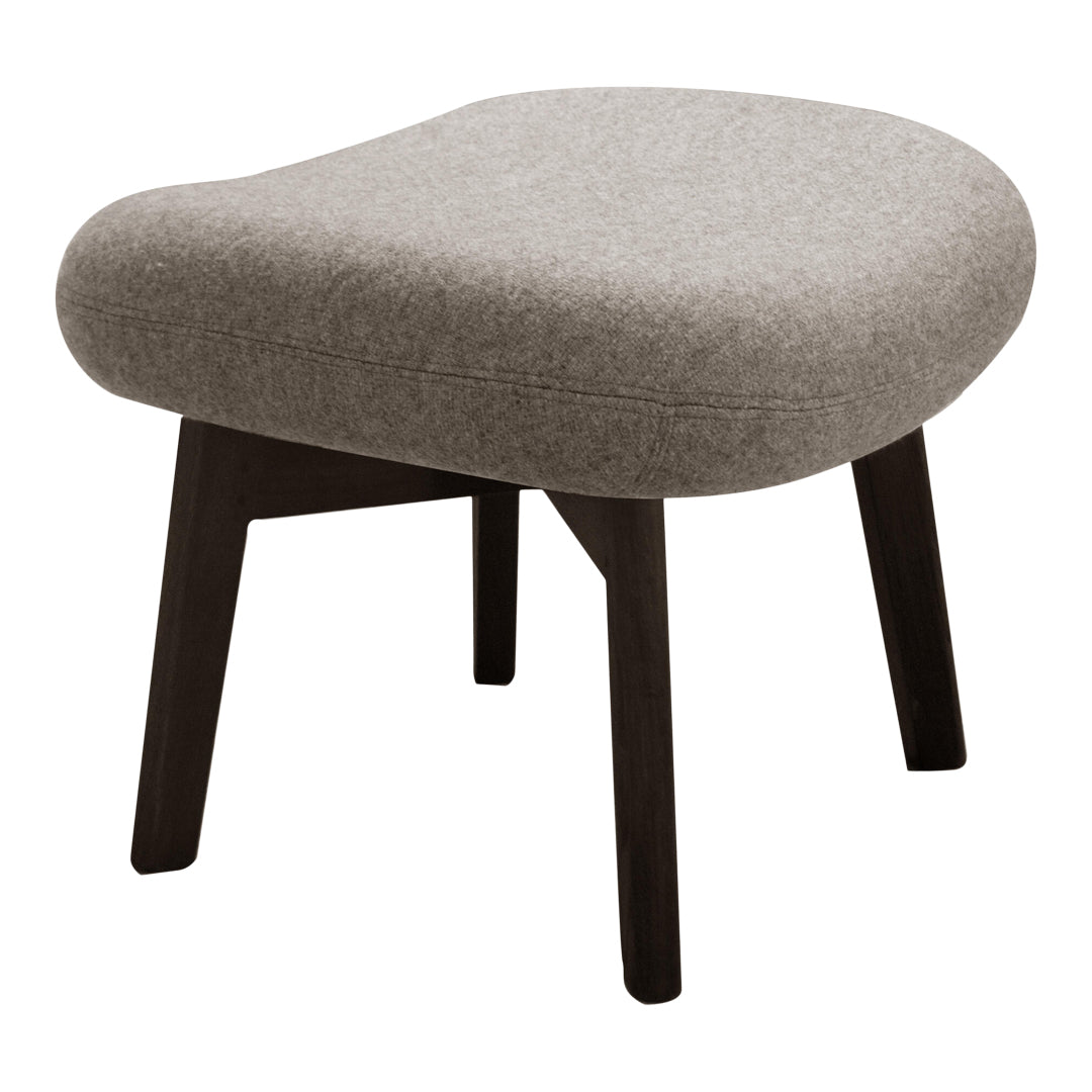 Gray upholstered ottoman with a smooth, rounded design and dark wooden legs. Minimalist style, perfect for modern decor.
