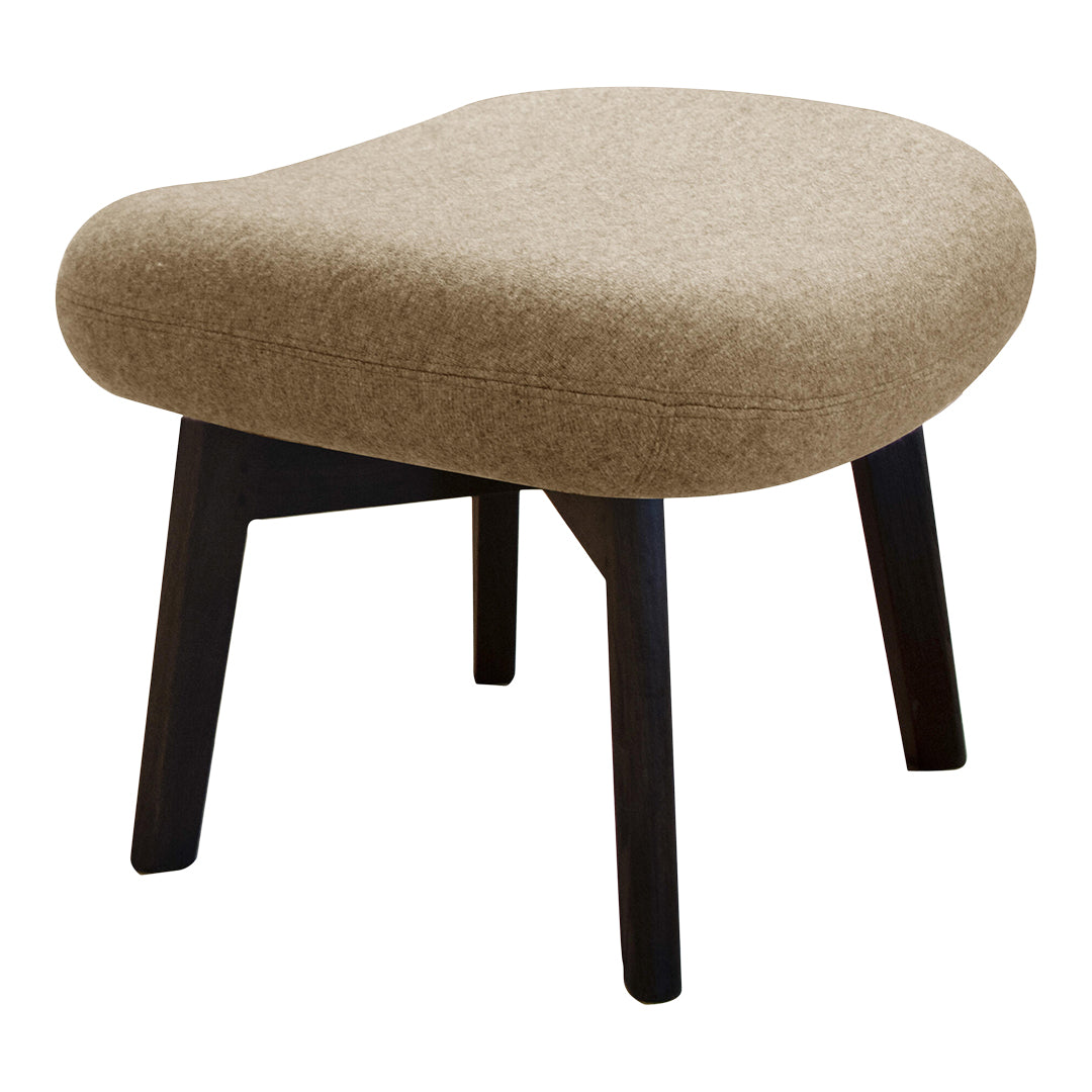 Beige upholstered ottoman with a smooth, rounded shape and dark wooden legs, perfect for modern decor.