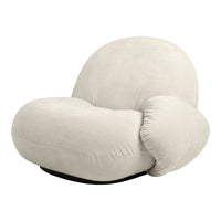 Cream-colored, plush chair with a smooth, rounded shape and minimalistic design, perfect for contemporary decor.