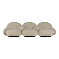 Beige three-seater sofa with plush rounded cushions and smooth lines, perfect for modern interiors.