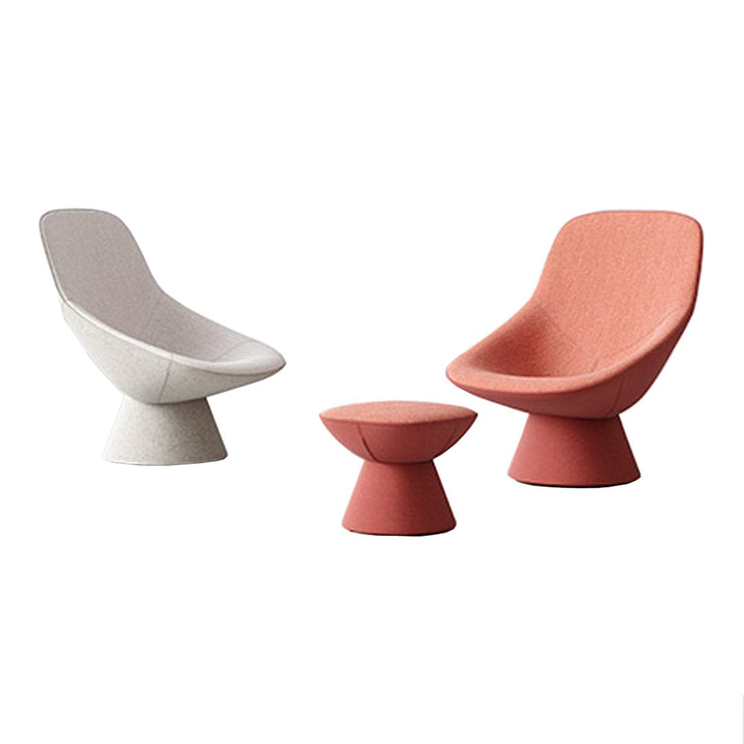 Modern lounge chair set featuring soft gray and peach tones, with smooth, minimalist shapes and textured fabric.