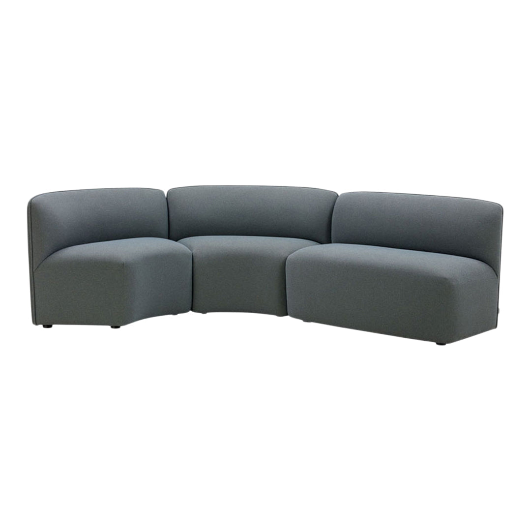 Curved sectional sofa in a sleek, solid gray fabric with a modern, minimalist design.