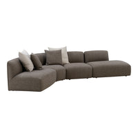 Curved sectional sofa in a warm taupe fabric with subtle texture, complemented by light beige decorative pillows.