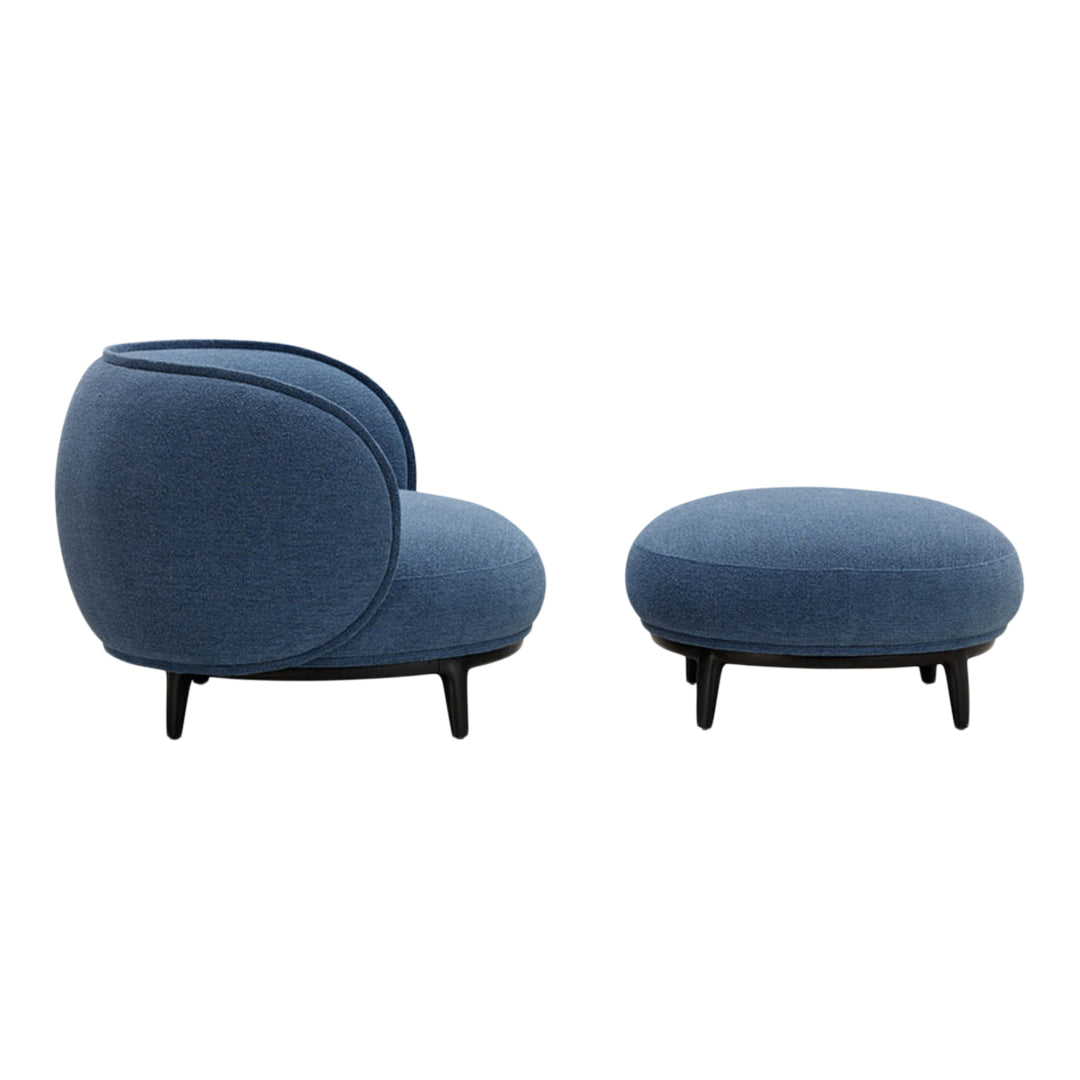 Blue upholstered chair and ottoman set with a smooth, rounded design on black wooden legs.