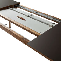 Wooden expandable table with dark brown top and natural wood accents, showcasing sleek lines and modern design.