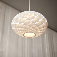White geometric pendant lamp with a textured, diamond-patterned design. Perfect for modern interiors.